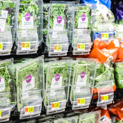 A selection of salad mixes at a grocery store