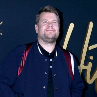 James Corden in a blue jacket