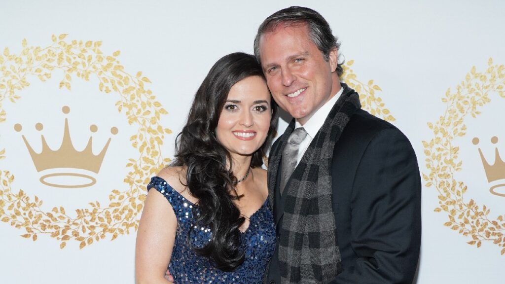 Danica McKellar and her husband Scott Sveslosky pose together on the red carpet