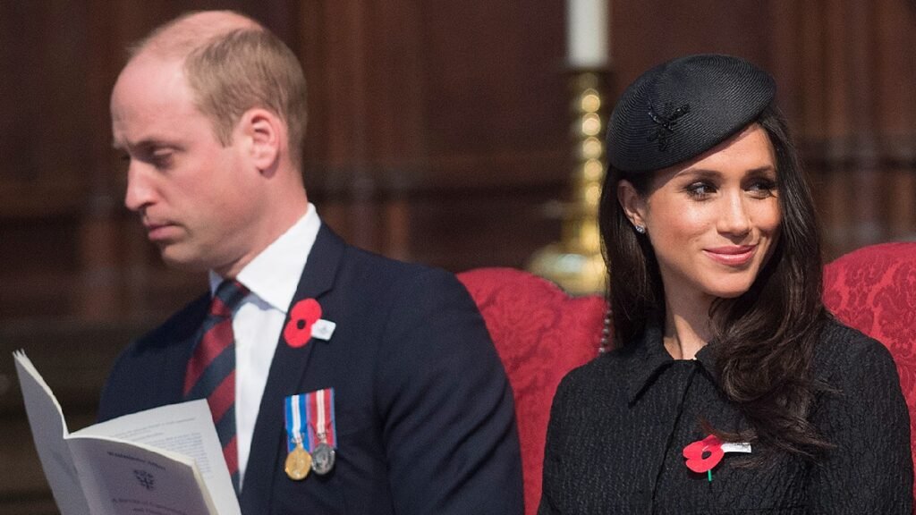 Prince William and Meghan Markle sit next to each other in church while wearing dark clothing