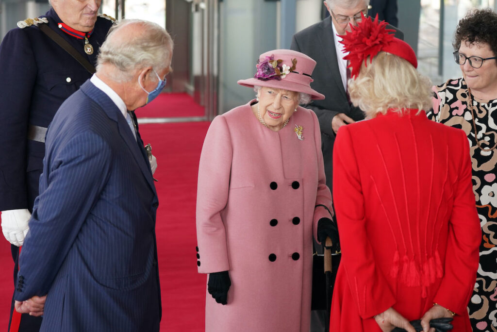 Prince Charles, Queen Elizabeth, and Camilla Parker Bowles standing together