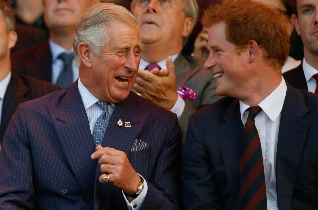 Prince Charles on the left laughing with Prince Harry