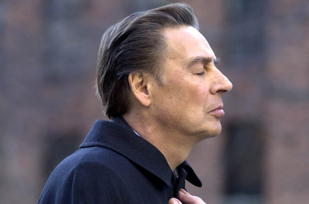 Jerry Orbach in profile with is eyes closed, on the set of Law & Order