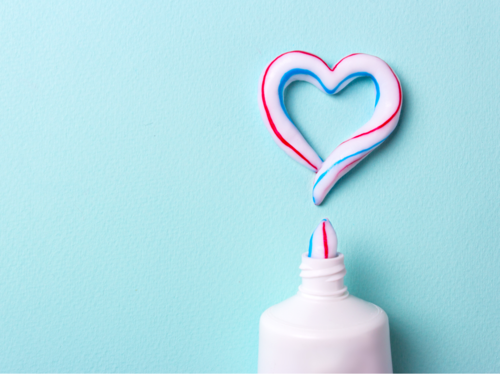 Heart symbol made from toothpaste.