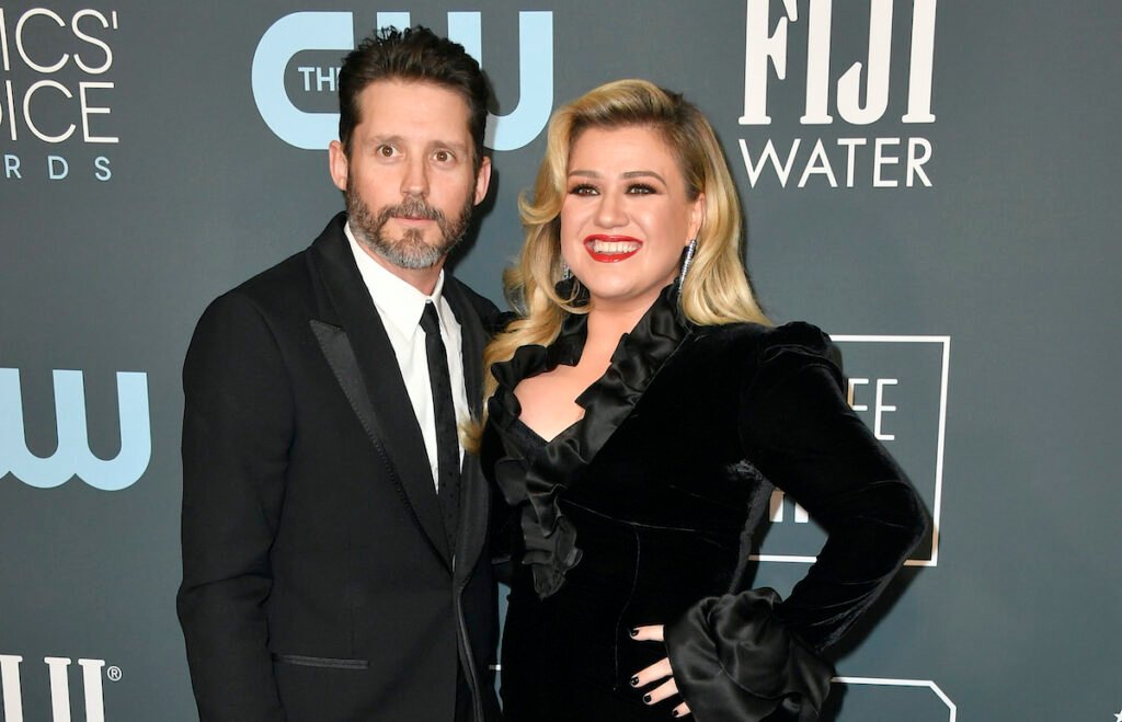 Kelly Clarkson in a black dress with ex-husband Brandon Blackstock in a black suit