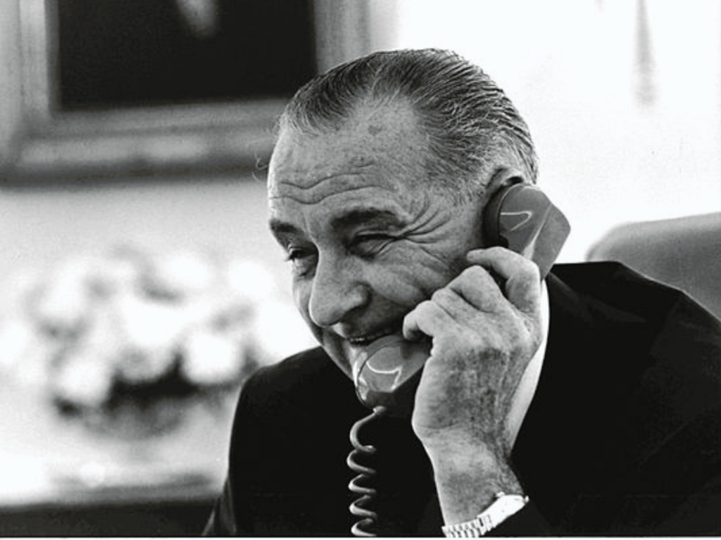 Lyndon B. Johnson talks on the phone