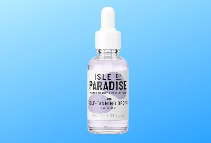 A bottle of Isle of Paradise Self-Tanning Drops for face and body.