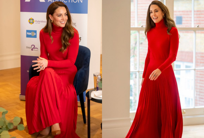 Kate Middleton wearing a cherry red turtleneck sweater, matching long skirt, and dark red pumps