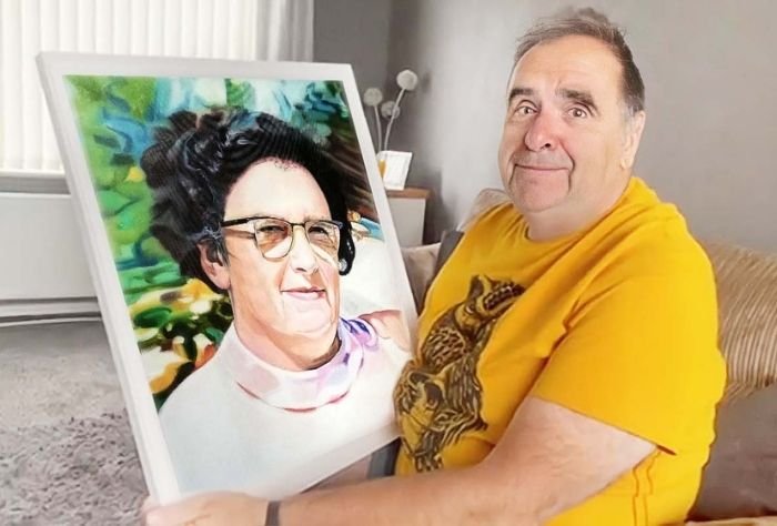 Man holds Paint Your Life portrait