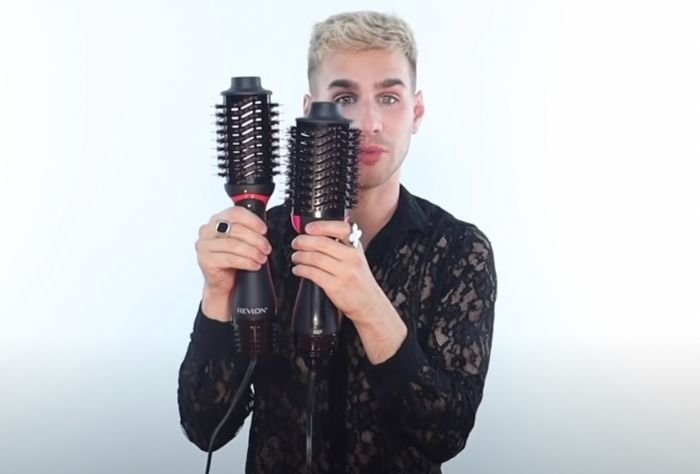 Haidresser Brad Mondo holding two versions of Revlon Volumizer