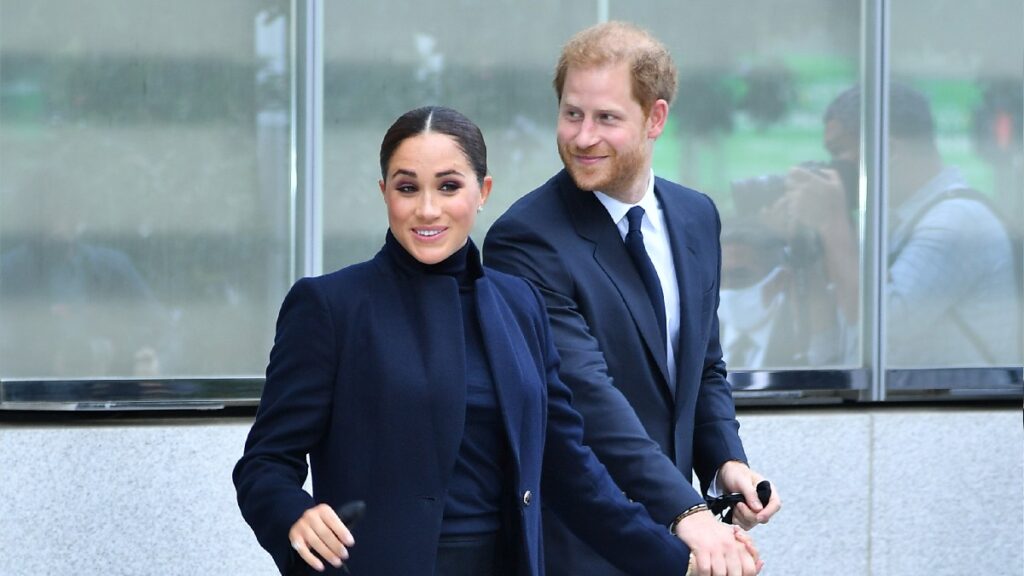 Meghan Markle and Prince Harry, both dressed in dark blue, visit New York City