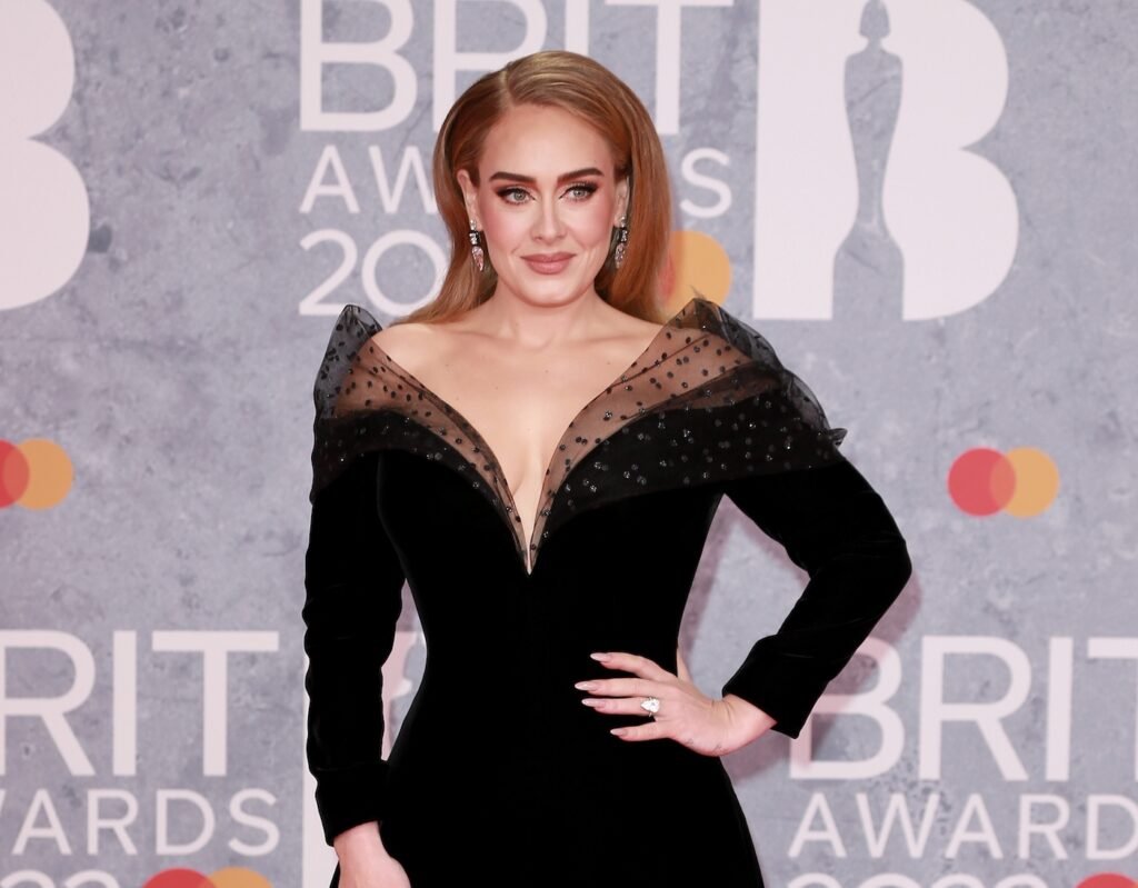 Adele in a black dress