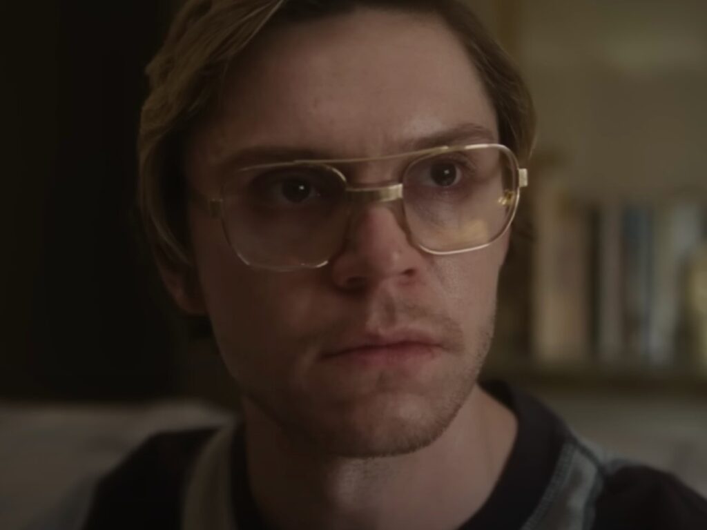 Evan Peters portraying Jeffery Dahmer in a closeup image