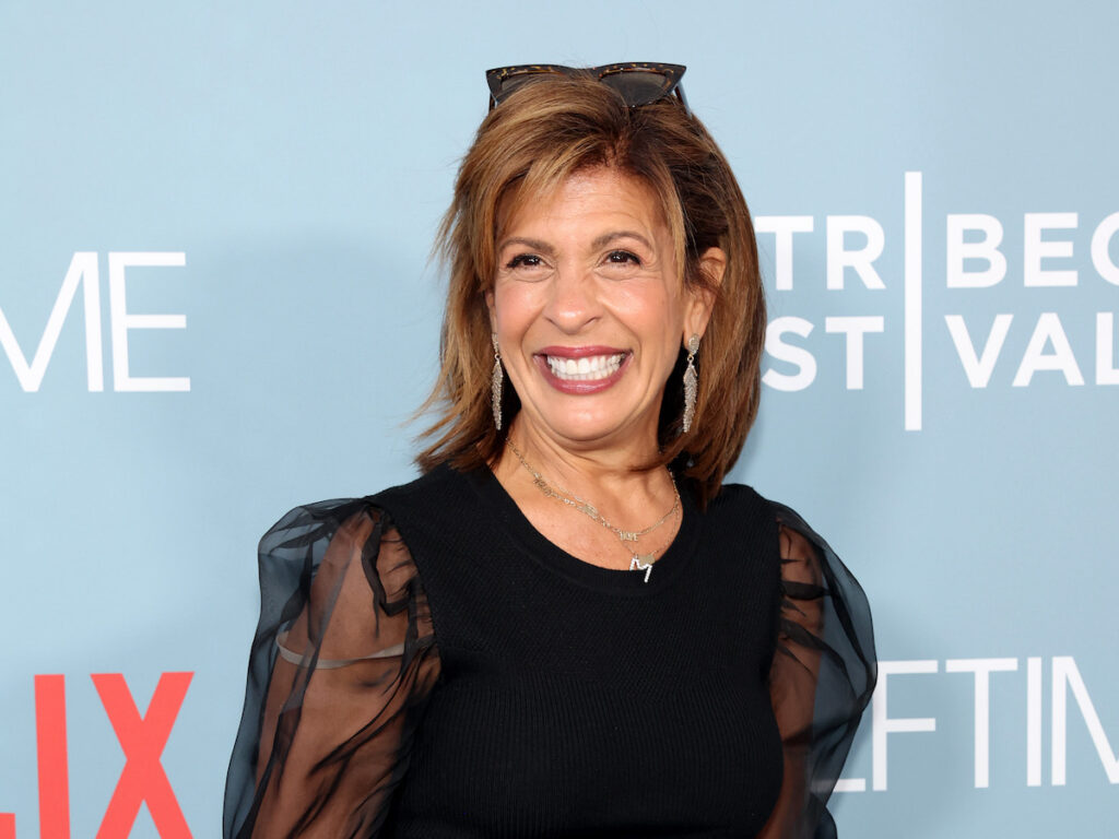 Hoda Kotb smiling in a sheer black dress