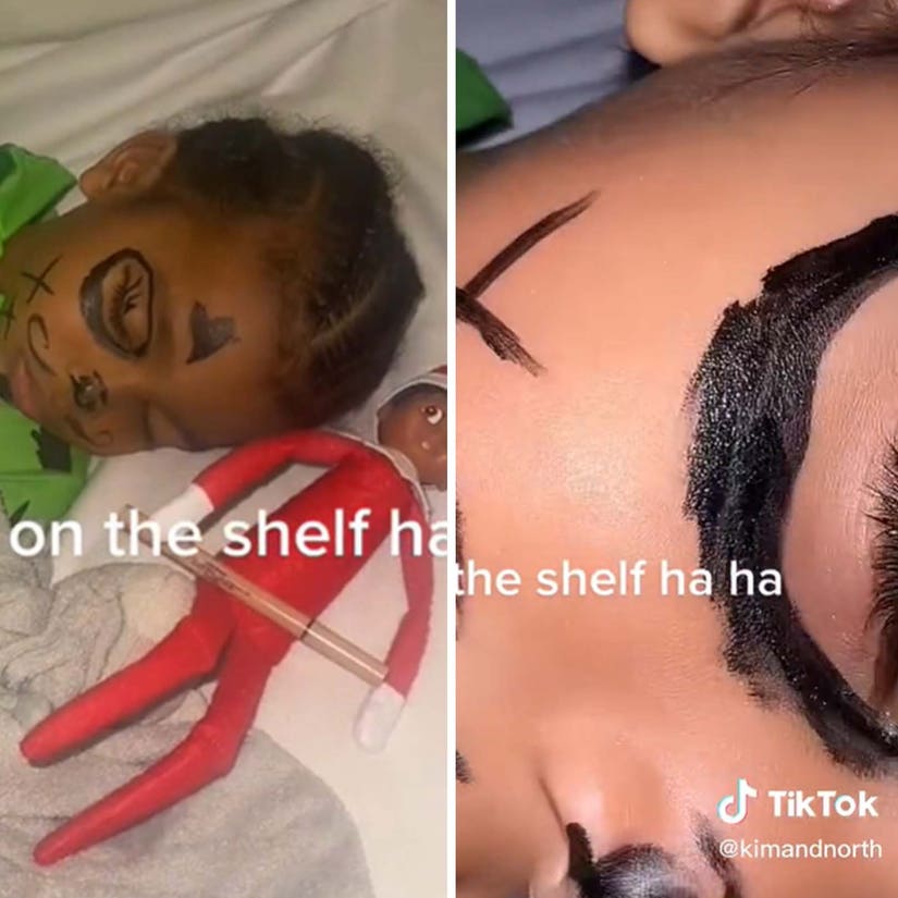 North West Draws on Sleeping Psalm's Face With KKW Eyeliner as an Elf on the Shelf Prank